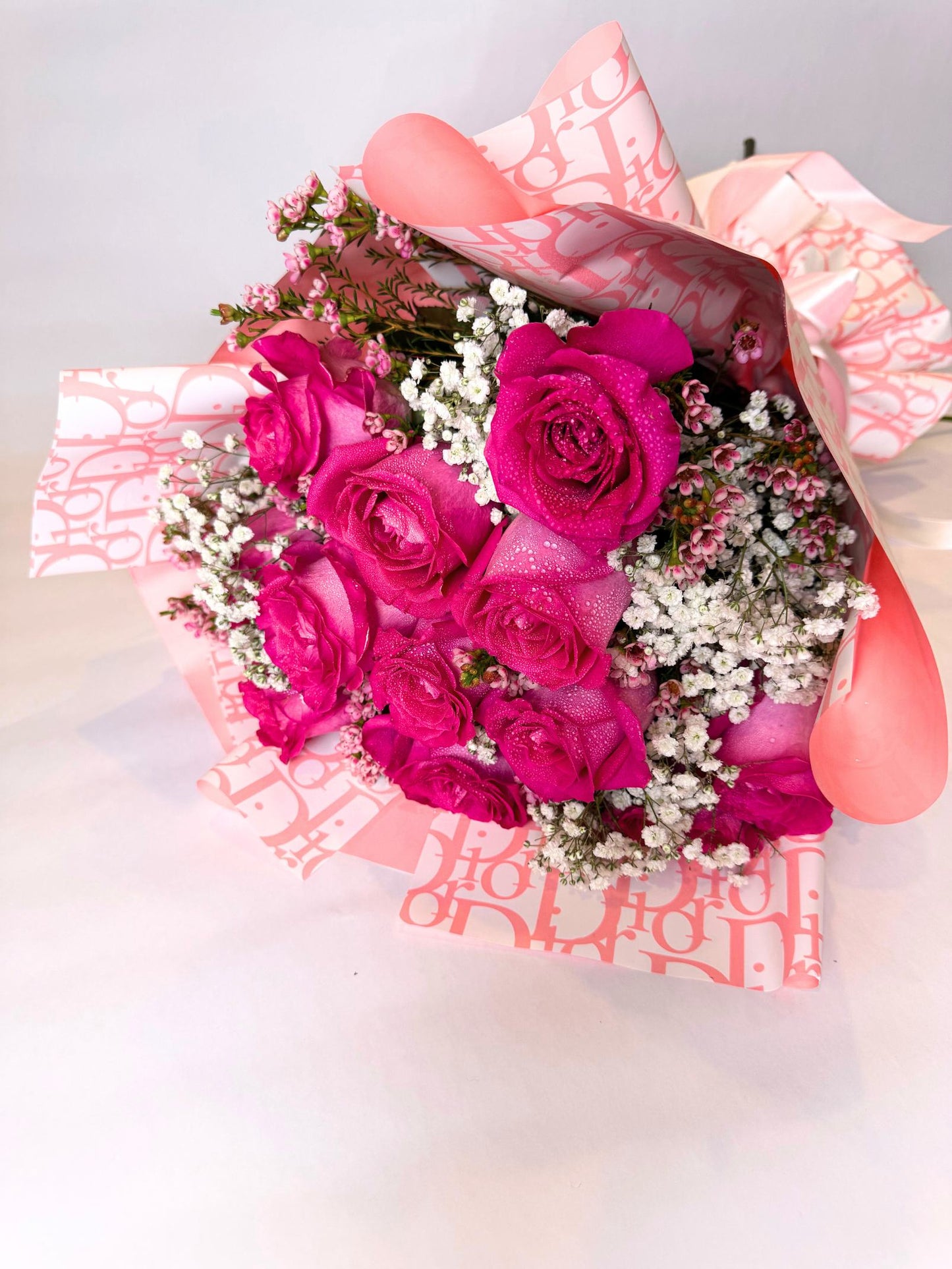 "Sweetheart" One Dozen Fuchsia Roses